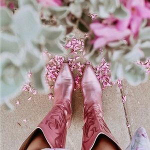 Pink with stitching, cowboy boots